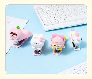 Cute cartoon mini stapler with soft rubber cover, creative student stationery for office use.