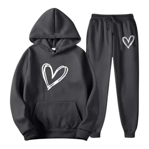 Dark grey tracksuit set with a white hand-drawn heart print, comfortable hoodie and sweatpants.