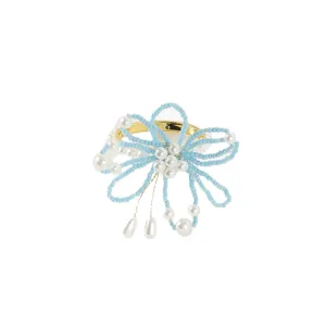 Parel libel servettenring detail, blauw kraaltje strik decor, elegante gouden metalen ring.