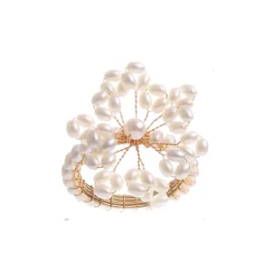 Elegant gold pearl napkin ring for wedding party hotel table decor and chic dining settings.