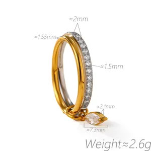 Detail view of double layer stacked ring with marquise zirconia pendant and paved stones.