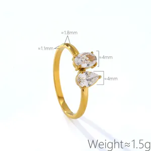 Detailed view of stainless steel double pear zircon ring, highlighting gold-plated band and size.