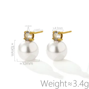 Elegant pearl stud earrings with sparkling zircon crystal and gold-plated setting. Size details.