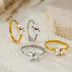 Stainless steel double zircon ring detail view, elegant gold and silver stackable rings.