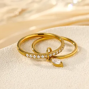 Gold double layer stacked ring with marquise zircon pendant and sparkling pavé crystal stones.