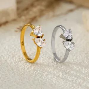 Stainless steel double zircon ring detail, elegant heart and teardrop design for women.