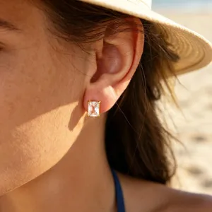 Elegant rectangular zircon stud earrings with gold-plated four-prong setting for women.