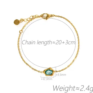 Detailed view of the irregular blue zircon gold-plated chain bracelet showing precise dimensions.