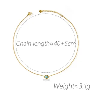 Detail view of gold-plated chain necklace featuring an irregular blue zircon stone pendant.