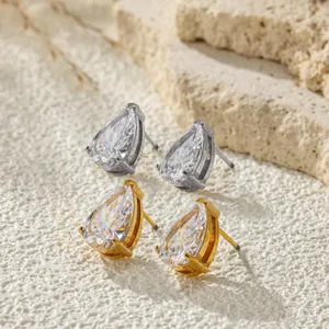 Pear-shaped cubic zirconia stud earrings detail showcasing sparkle and four-prong setting.