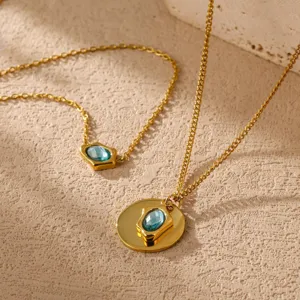 Gold-plated necklace detail showcasing exquisite irregular blue zircon pendant craftsmanship.