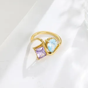 Gold plated double stone ring with purple and blue cubic zirconia for women stylish jewelry.