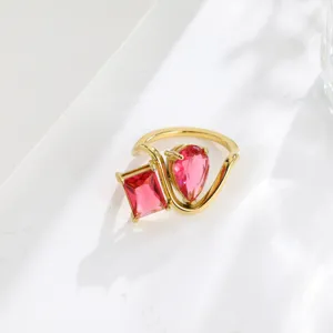 Exquisite 18k gold plated double cubic zirconia ring detail shot, elegant geometric hollow design.