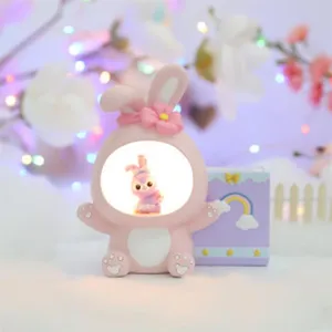 Cute pink rabbit night light desktop ornament with glowing design, perfect room decor gift.