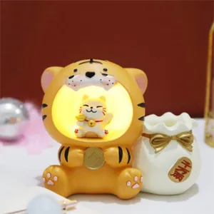 Cute cartoon tiger lucky cat glowing pen holder resin ornament for room decor desk setup.