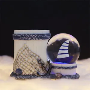 Nautical seashell sailboat pen holder night light, creative resin snow globe room decor.