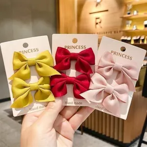 Set di graziose mollette per capelli a fiocco fatte a mano per bambine, tre colori.