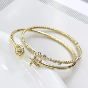 Bracciale aperto placcato oro 18k con zirconi stella marina e conchiglia tendenza