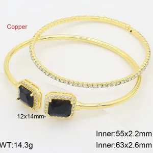 Detail of double layer gold plated copper cuff bracelet with black square stone and zirconia.