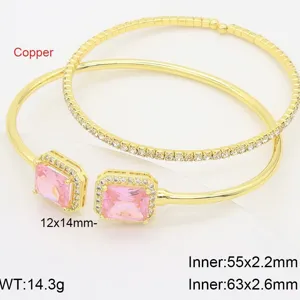 Gold-plated dual layer bracelet detail featuring a sparkling pink rectangular cubic zirconia stone.