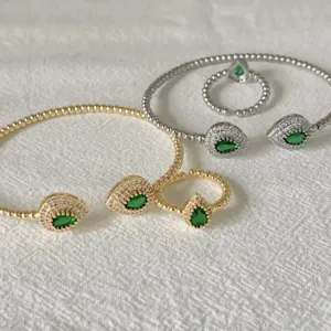 Set bracciale anello aperto zircone pera verde, gioielli alla moda placcati oro 18k.