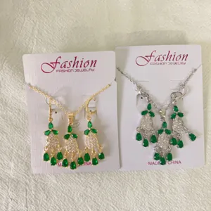 Elegant vintage style brass micro-pave zirconia tassel necklace and earrings set.
