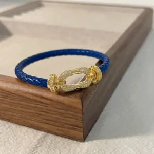 Blue braided leather bracelet with gold pave diamond horseshoe clasp couple fashion jewelry gift