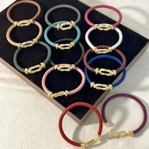 Colorful braided leather rope bracelets with gold paved horseshoe clasp, fashion jewelry.