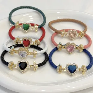 Detailed view of stylish heart cubic zirconia braided leather bracelets in various colors.