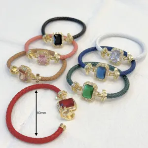 Bracciale in pelle intrecciata di lusso con chiusura rettangolare placcata oro 18k e strass moda