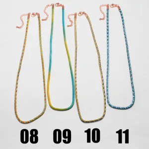 Colorful handmade braided rope necklace detail with rose gold clasps and extender chains.
