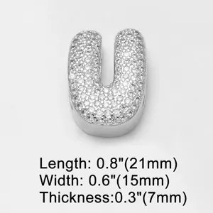Silver tone letter U charm pendant paved with cubic zirconia for DIY jewelry making.