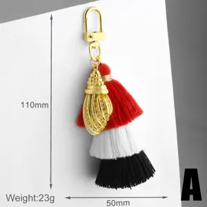 Porte-clés pompon tricolore avec coque en métal, longueur 110mm, pendentif élégant pour sac à main.