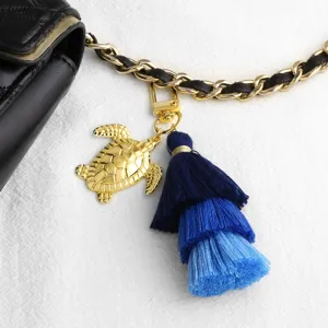Porte-clés Pendentif Tortue de Mer Étoile de Mer Coquillage en Cuivre Électroplaqué Style Occidental Avec Gland en Tissu Dégradé pour Décoration de Sac Femme
