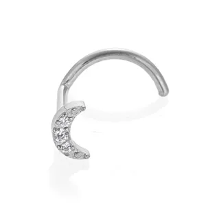 Detail shot of F136 titanium nose stud with crescent moon and sparkling cubic zirconia stones.