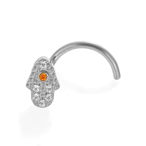 Detail view of titanium hamsa hand nose ring, featuring sparkling white and orange cubic zirconia stones.