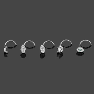 Titanium crystal nose studs set, 5 pieces piercing rings with moon and eye charms.