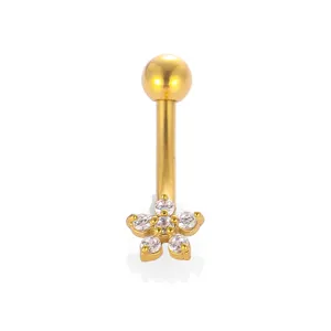 Gold stainless steel curved navel piercing ring featuring a clear cubic zirconia flower charm.