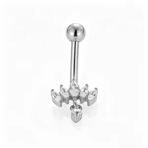 Detail shot of stainless steel navel ring with crystal cubic zirconia and dangling crown charm.