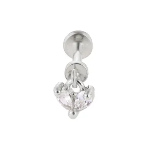 Close-up detail of titanium steel labret piercing stud with sparkling cubic zirconia heart.
