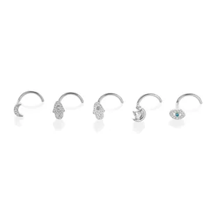 Titanium zirconium nose studs set, moon and hamsa hand body piercing jewelry items.