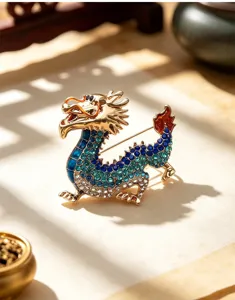 Detailed shot of a vintage Chinese style dragon brooch, glittering rhinestone metal suit pin.