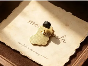 Detailed close-up showing the reverse side of the retro cat bartender brooch with secure clasp.