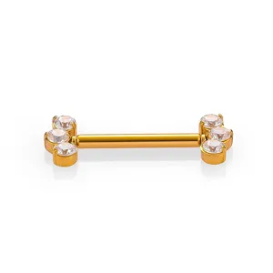 Close-up detail of stainless steel barbell body piercing jewelry with sparkling cubic zirconia stones.