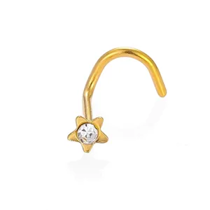 Detailed view of gold stainless steel star cubic zirconia nose stud body piercing jewelry.