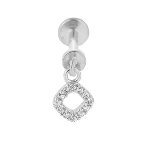 Detail shot of a titanium steel labret piercing featuring a micro-paved zirconia square charm.