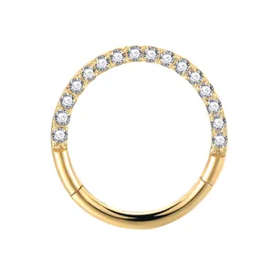 Gold titanium hinged segment ring with dazzling cubic zirconia pave, perfect for cartilage piercing.