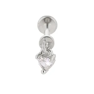 Detail view of a titanium steel piercing jewelry featuring a sparkling heart zirconia stone pendant.