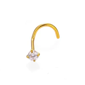 Close-up detail of stainless steel nose stud with sparkling cubic zirconia stone.