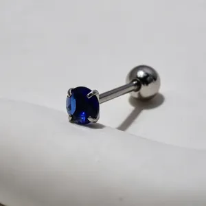 Stainless steel tongue ring with blue cubic zirconia, four-prong set body piercing jewelry.